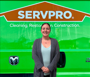 tech in front of Servpro van