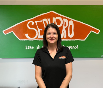 female servpro employee in black shirt