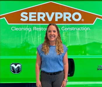 tech in front of Servpro van